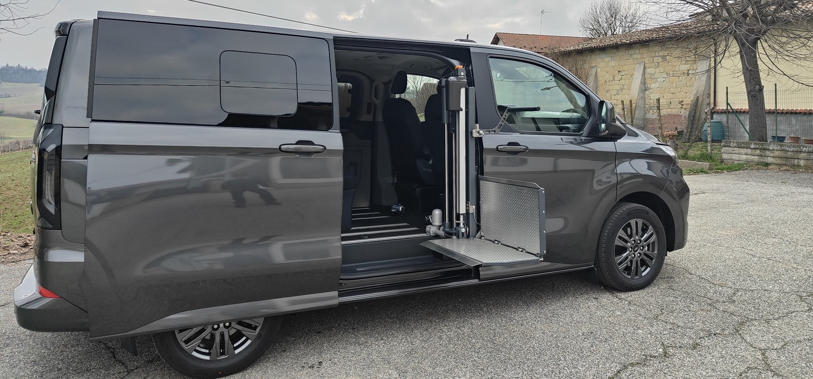 Sollevatori automatici, rampe e sistemi di ritenuta